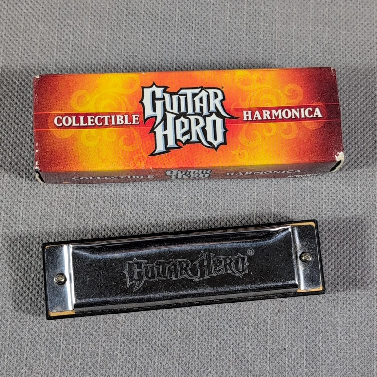Guitar Hero Harmonica Activision collectible - Damaged Box | eBay