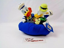 Disney 65th Anniversary - 4 Donald's Sitting in Donald Hat