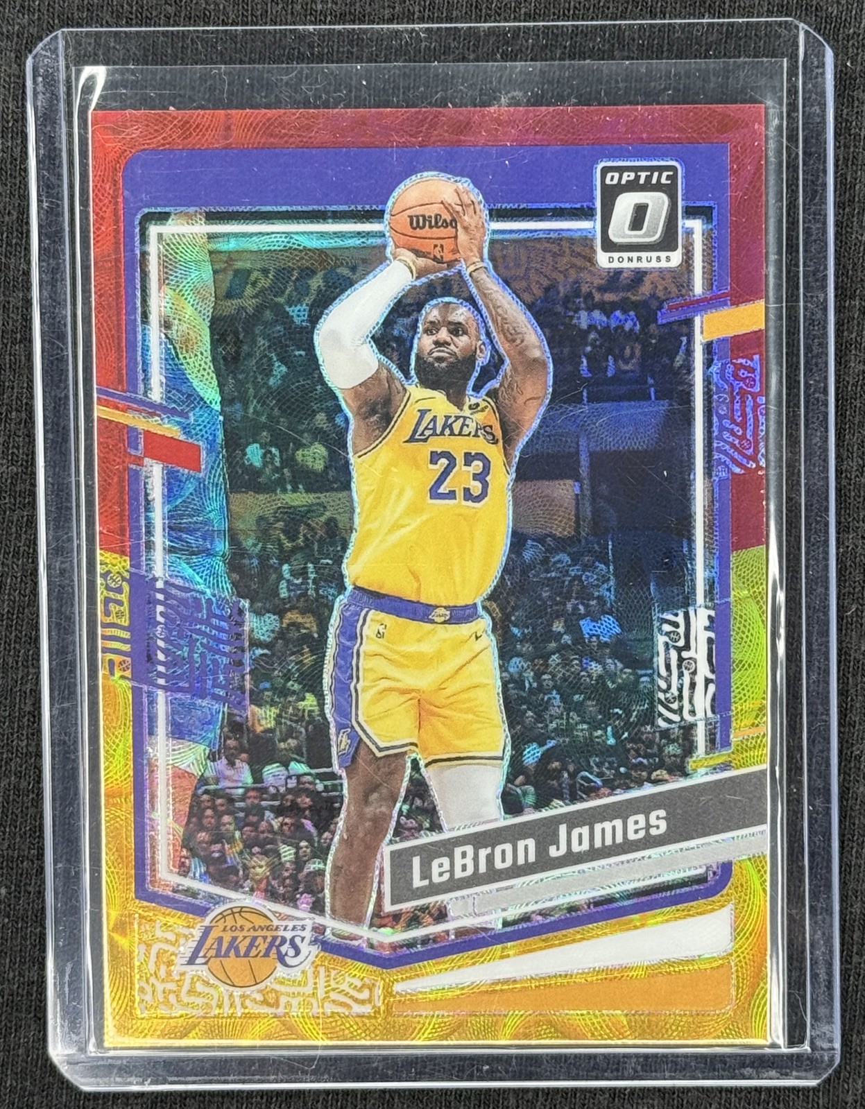 2023-24 Panini Donruss Optic LeBron James International Red & Gold Prizm /99 #65