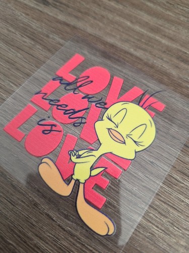 Calcomanía a todo color Tweety Bird "All We Need Is Love" elevada UV DTF 3 pulgadas X 3 pulgadas - Imagen 3 de 4