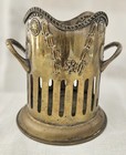 Vintage Solid Brass Embossed Wine/champage Bottle Holder. Measures 6.5"H X 5.5"D