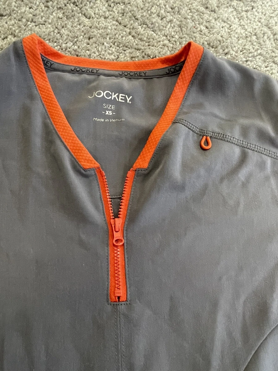Orange store scrub jacket