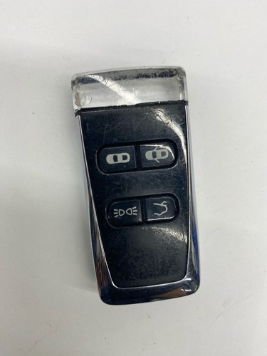 2015 ASTON MARTIN RAPIDE KEYLESS ENTRY KEY FOB REMOTE TRANSMITTER 7007208 OEM - Picture 1 of 11