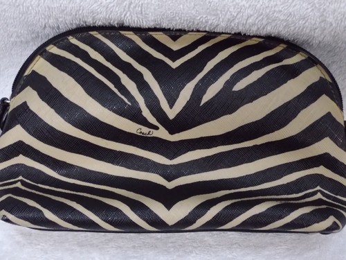 Bolso tipo muñeca Coach negro tostado cebra maquillaje cosmético multifunción - Imagen 7 de 12