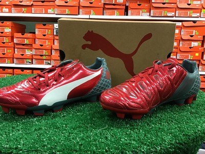 red puma cleats