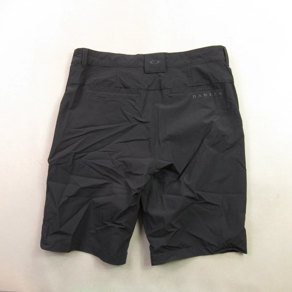 Pantalones Cortos Oakley Para Hombre 30 Bolsillos Ligeros Botón Exterior Chino Negro Foto 4 de 4