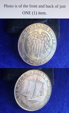 American Argent Mint Ltd World Trade Shield 1 Oz .999 Fine Silver Round Toned 60.00 per troy oz