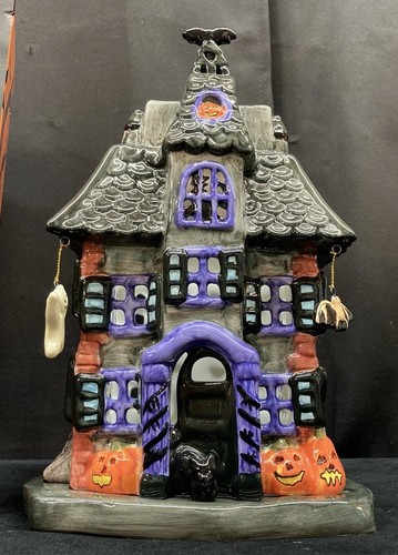 JC Penney Home Collection Ceramic Haunted House Luminary 11” - Picture 3 of 18