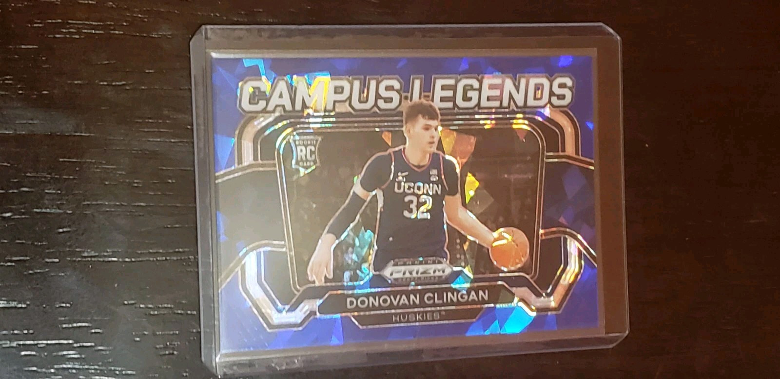2024 PANINI PRIZM DRAFT PICKS DONOVAN CLINGAN CAMPUS LEGENDS RC BLUE ICE #56/99