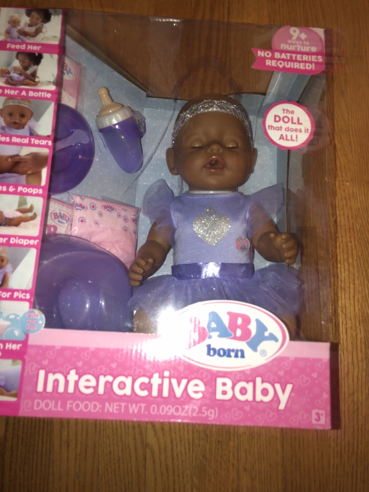 baby born brown eyes doll