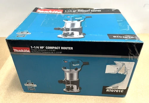 MAKITA RT0701 new sealed six and a half amp variable speed compact router