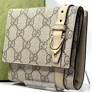GUCCI bi pli GG Supreme avec ceinture motif GG bon état