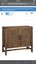 warwick 2- door wood and rattan accent table -brown