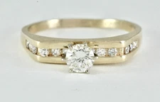 0.39 ctw Diamond Solitaire with Accents Engagement Ring 14k Yellow Gold
