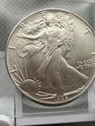 1986 American Silver Eagle BU Coin 1 Oz $1 Uncirculated, reverse natural toned