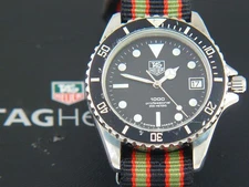 TAG Heuer 1000 980.013L with a lot of new parts for repair on Nato band from EU