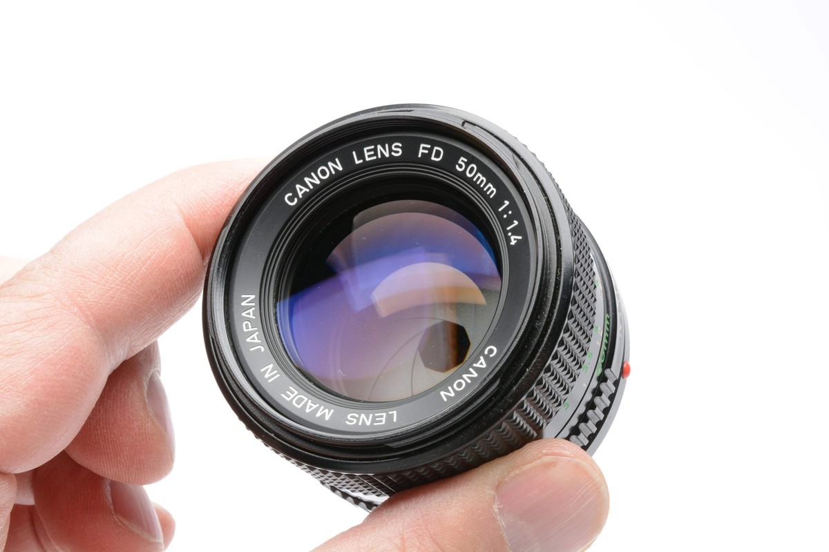 Canon new FD 50mm f1.4 prime lens, caps, UV filter, clean Canon new FD 50mm f1.4 prime lens, caps, UV filter, clean