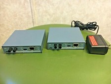 lot of 2 Allied Telesyn AT-MC101 Ethernet Media Converters, w/ 1 each PS