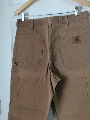 Pantalones cargo de lona Carhartt Duck 34x34 marrón ropa de trabajo exterior logotipo peso pesado  - Imagen 8 de 11