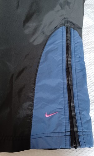 NIKE GIRLS LARGE US SIZE 14 LINED WINDBREAKER PANTS ZIP BOTTOM BLACK PINK SWOOSH - Picture 4 of 12