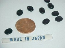 50 VINTAGE JAPAN JET BLACK GLASS 8x6mm. OVAL CABOCHONS L710