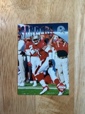 1995 Collector's Edge.         Deion Sanders.         # 34.         POP WARNER