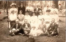 Postcard Real Photo RPPC Family Photo Men & Women with Straw and Flowered Hats