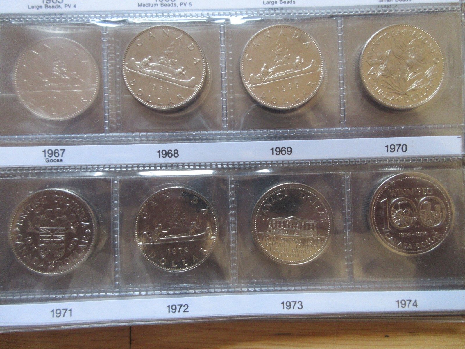 Set of Canada Nickel Dollars Coins Brown UNI-SAFE Album 1968-1986. UNC Coins