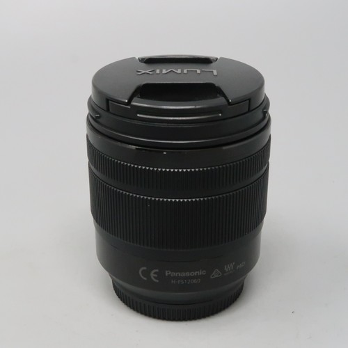 Panasonic Lumix G Vario 12-60 mm F3.5-5.6 Power O.I.S. Obiettivo MFT -- più tappi - Foto 5 di 8