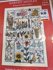 Imaginating cross stitch kit Garden Medley Mix of flowers sayings and birds