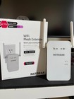 Netgear EX6100v2 AC750 Dual Band WiFi Range Extender is a wireless networking