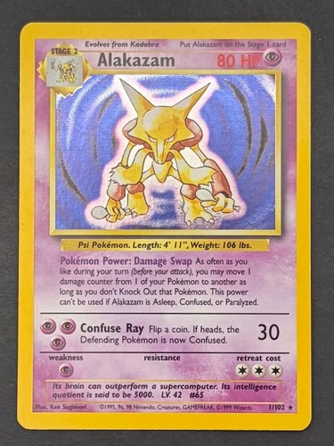 Pokémon Card Alakazam 1/102 Holo Base Set - Heavily Played - Picture 1 of 2