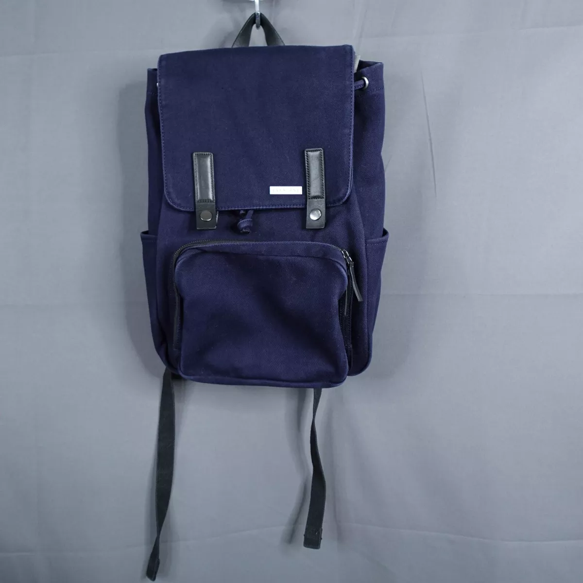 The modern top snap backpack