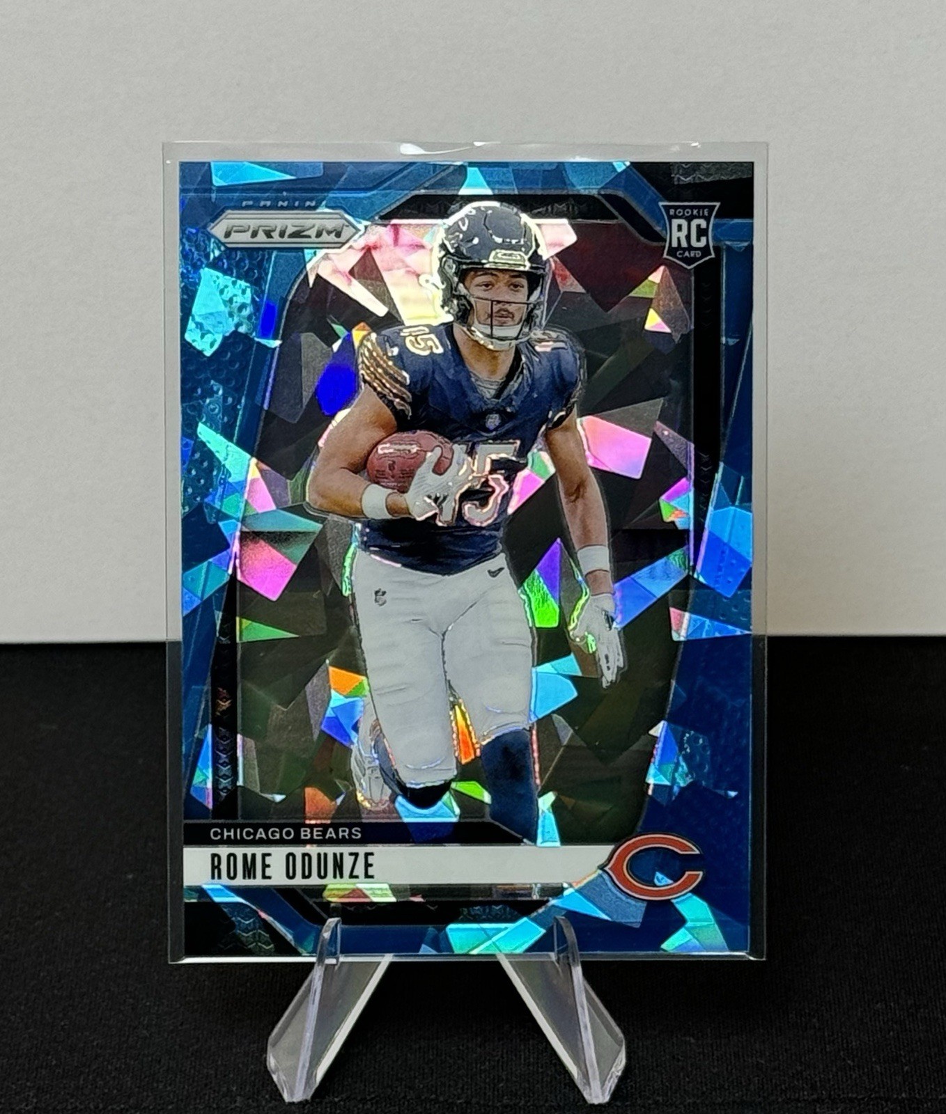 2024 Panini Prizm - Rookies Rome Odunze #385 Blue Ice Prizm /99 (RC)