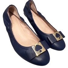 Kate Spade Maline ballet flat in navy leather with a gold spade logo size 8M