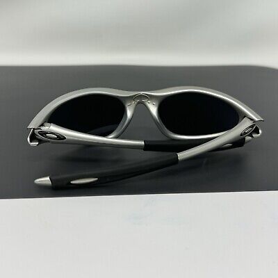 Oakley Minute FMJ 5.56 Silver Sunglasses - Black Iridium | eBay Oakley Minute FMJ 5.56 Silver Sunglasses - Black Iridium | eBay