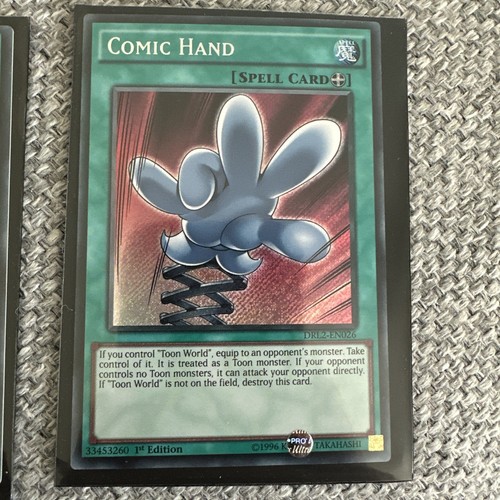 Comic Hand - Secret Rare 1st Edition DRL2-EN026 - NM - YuGiOh