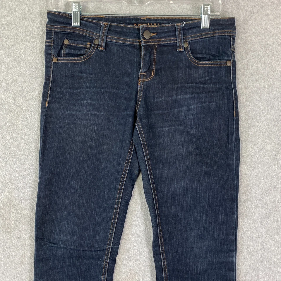 Pantalones de mezclilla azul asfalto para mujer 7 azules pierna ajustada tiro bajo elásticos lavado oscuro Foto 2 de 4