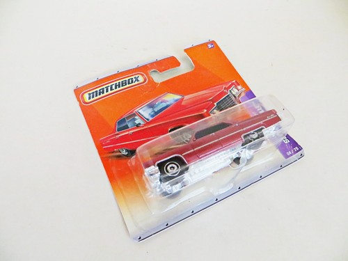 MATCHBOX 24/75 'CADILLAC SEDAN DEVILLE' METALLIC RED. MIB/BOXED/CARDED - Picture 2 of 4