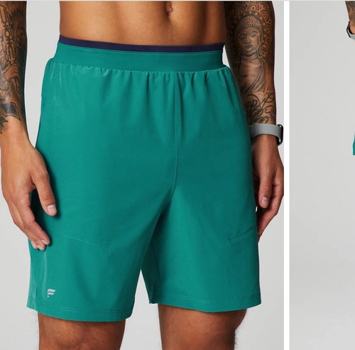 Fabletics Herren M-The 7" Fundamental Shorts II ungefüttert Miami Tide türkis blau neu mit Etikett - Bild 1 von 3