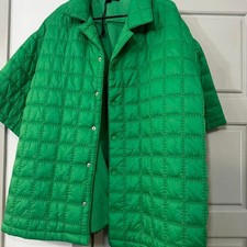 Green puffer jacket with button up