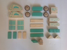 Juego de bloques de madera magnéticos Tegu Collection 24 piezas + 4 ruedas FUTURO + EN MUY BUENA CONDICIÓN