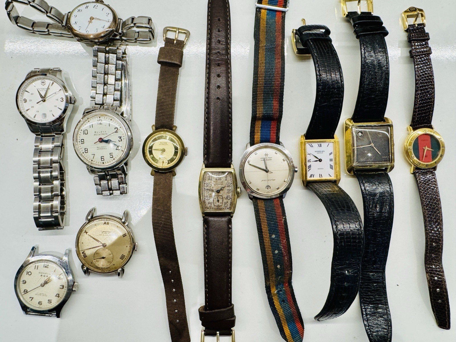 Lot of Tissot, Raymond Gucci, and Manual Doxa 11 Longines, Quartz watches- Weil, - vintagewatches.pk