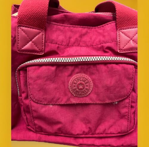 BOLSO DE MANO KIPLING ROSA BRILLANTE MONO ISABEL BOLSILLOS DELANTEROS CREMALLERAS K - Imagen 2 de 9