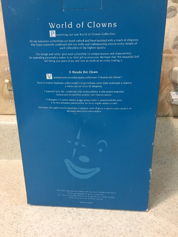 world of clowns porcelain doll