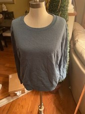 Ladies sz medium basic sweatshirt in medium Blue by Divided/H M.