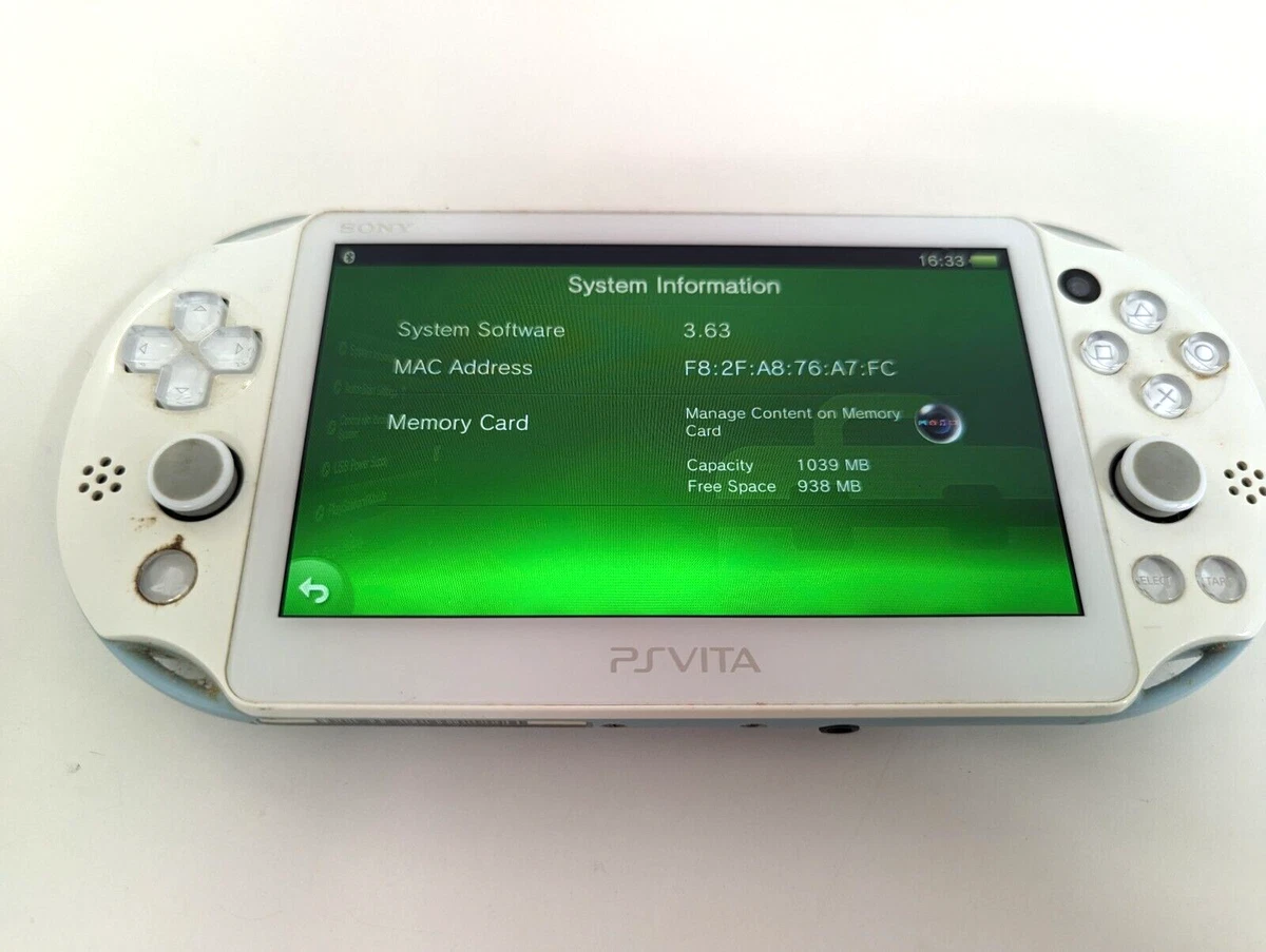 E31 Sony PS Vita PCH 2000 console White x Blue Handheld system PSV Japan USED