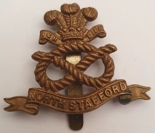 WW1 North Stafford Regiment Economy All Brass Cap Badge. Slider to Rear