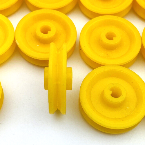 12 Vtg Construx Small Pulley Yellow Wheels by Fisher Price Replacement Parts - Picture 2 of 4