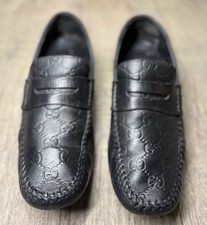 Gucci Black Loafers with Embossed Pattern